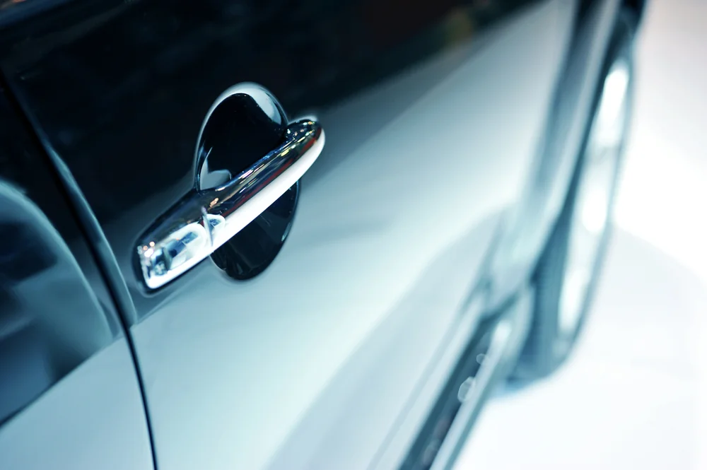 Close-up of polished car door handle and bodywork after smash repair — TKM Smash Repairs, Edmonton QLD